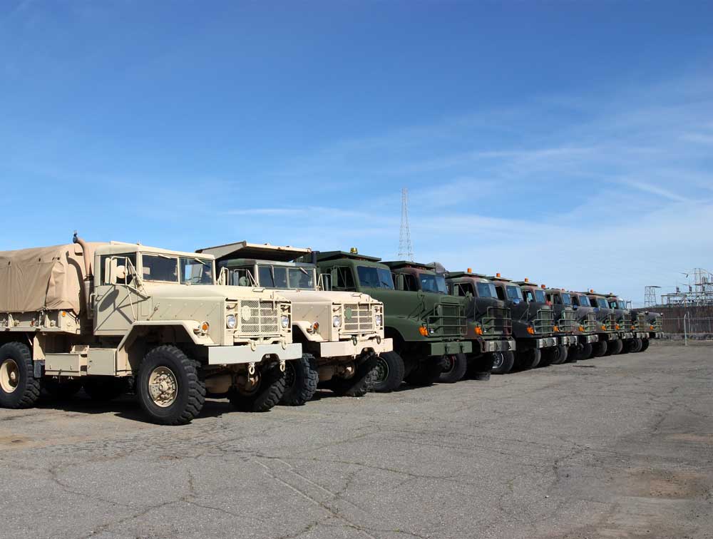 Military Vehicles in a line | US DOD | A James Global